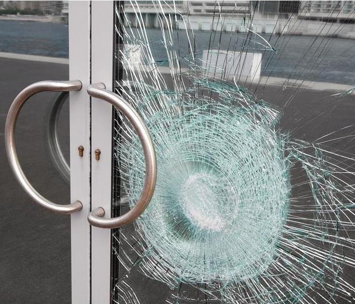 Shattered glass on a set of doors to a commercial property.